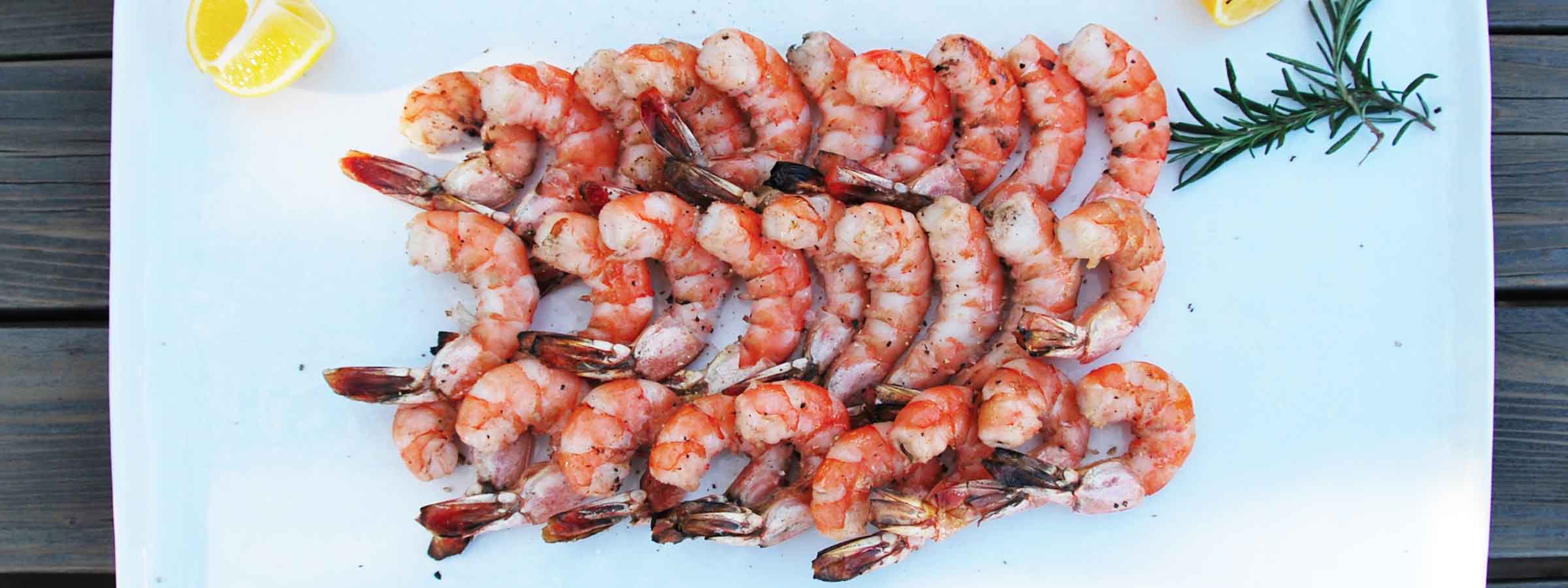 deep sea cooked shrimp on white plate